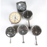 A Jaeger eight day automobile dashboard clock and a small collection of mainly Smiths dashboard