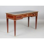 A 20th century French mahogany and gilt metal mounted writing table, fitted with three drawers,