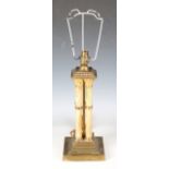 An early 20th century Neoclassical Revival gilt metal and banded onyx cluster column table lamp,