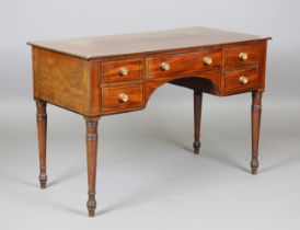 A Regency mahogany kneehole table, fitted with five ebony inlaid drawers, height 72cm, width