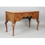 An early 20th century Queen Anne style walnut side table with oak-lined drawers, height 76cm,