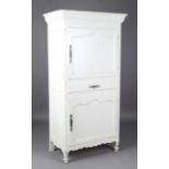 A 20th century French white painted armoire, fitted with two panelled doors and a drawer, height