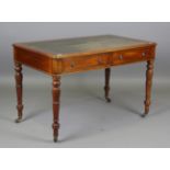A 20th century Victorian style mahogany writing table, the top inset with gilt-tooled green