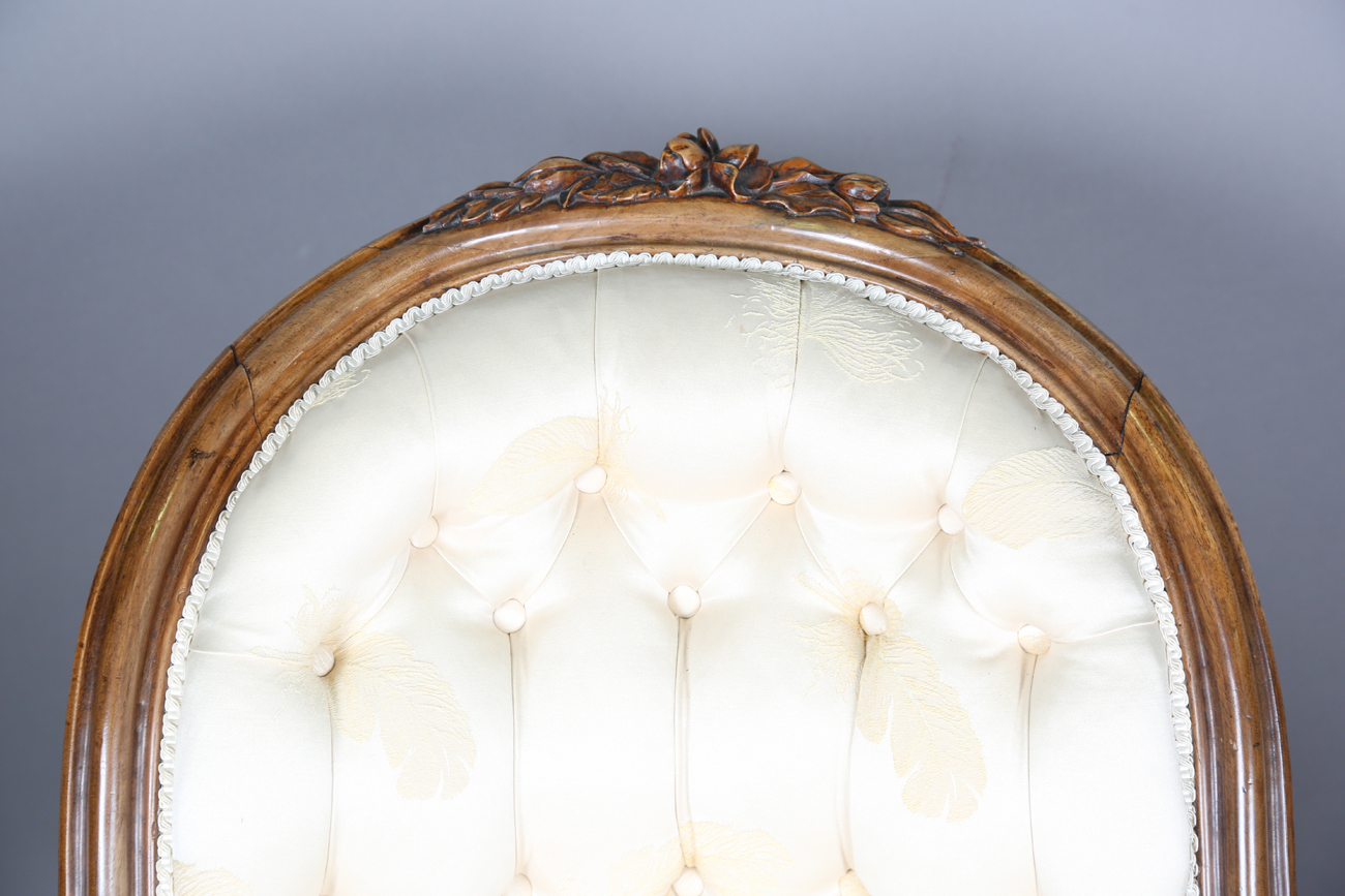 A fine mid-Victorian walnut showframe salon settee, the frame carved with flowers, leaves and fruit, - Image 11 of 11