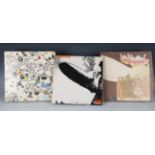 Three LP records, 'Led Zeppelin', 'Led Zeppelin II' and 'Led Zeppelin III', all early issues with