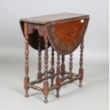 An early 20th century Jacobean Revival oak oval gateleg occasional table, carved with lunettes and