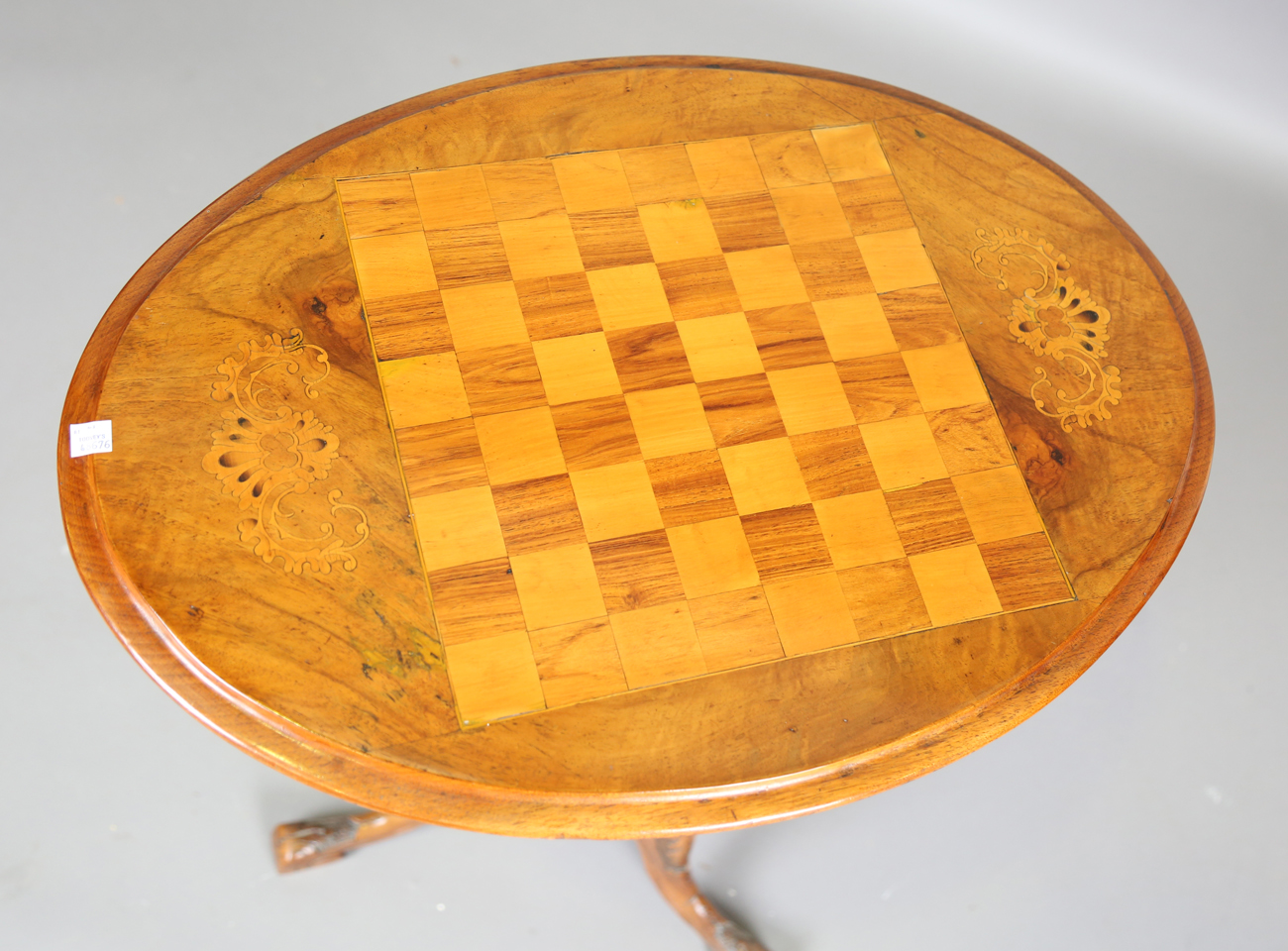 A late Victorian walnut oval games occasional table, the top inlaid with a chessboard, on a carved - Bild 6 aus 6