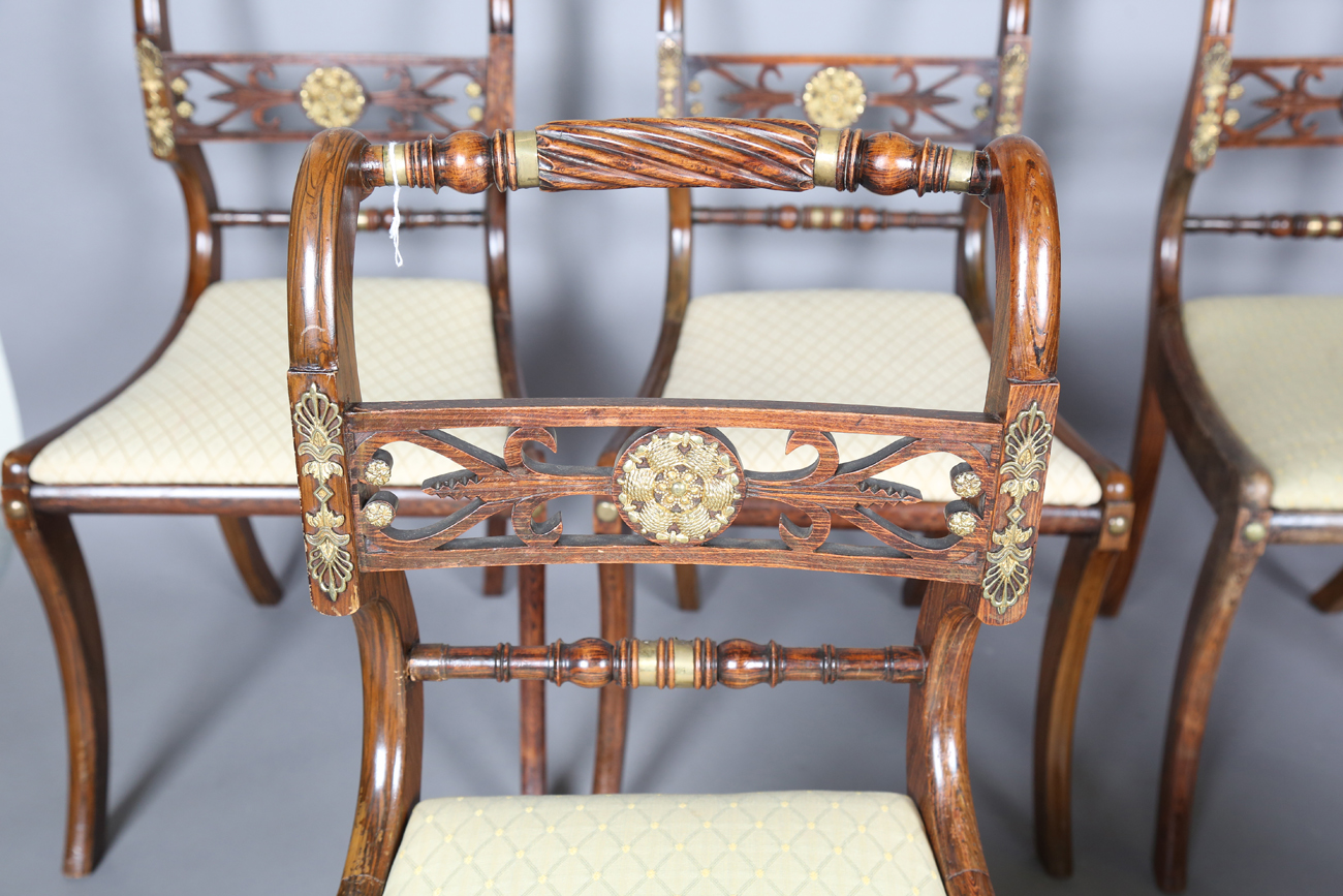 A set of eight Regency simulated rosewood and gilt brass mounted dining chairs, the centre rails - Bild 10 aus 25