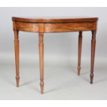 A George IV mahogany fold-over card table, the frieze with ebony stringing, height 74cm, width 91cm,