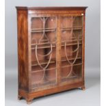 A fine George III mahogany glazed bookcase top, finely crossbanded in tulipwood and inlaid with