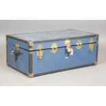 A late 20th century blue travelling trunk, width 91cm, together with an aluminium covered trunk,