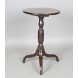 An early George III and later mahogany tip-top wine table with a finely carved stem, height 72cm,