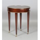 A modern Empire style mahogany and brass mounted circular table, fitted with a slide, height 67cm,
