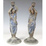 A pair of late 19th century Neoclassical Revival cast spelter figural candlesticks, height 39cm.