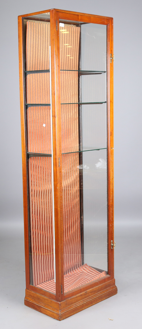 A late Victorian mahogany framed shop display cabinet, fitted with a single glazed door, height