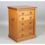 An early 20th century walnut Wellington chest of five drawers with applied brass handles, height