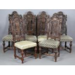 A set of six late 19th/early 20th century Continental Baroque Revival oak dining chairs with