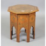 A 20th century Indian hardwood and brass inlaid folding occasional table, height 47cm, width 45cm.