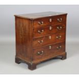 A small George III mahogany chest of four oak-lined drawers, height 80cm, width 80cm, depth 43cm.