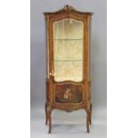 An early 20th century French kingwood and gilt metal mounted vitrine, the door panel and sides