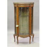 An early 20th century French rosewood and gilt metal mounted vitrine with an inset rouge marble