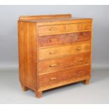 An early 20th century oak secrétaire chest, possibly by Heals, raised on tapering block legs, height