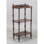 A Victorian rosewood three-tier whatnot, height 96cm, width 45cm, depth 30cm.Buyer’s Premium 29.