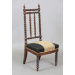 A Victorian simulated rosewood bobbin turned side chair, height 101cm, width 48cm.Buyer’s Premium