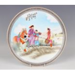 A Chinese famille rose porcelain circular dish, painted with a Cultural Revolution figural scene