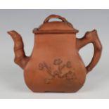 A Chinese Yixing stoneware teapot and cover, 20th century, of rectangular bombé form with