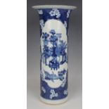 A Chinese blue and white porcelain cylinder vase, late 19th century, the body painted with