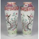 A pair or Chinese famille rose porcelain vases, Yongzheng style but late Qing dynasty, of tapered