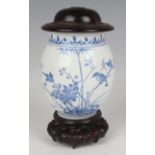 A Chinese Transitional blue and white porcelain jar, mid-17th century, the swollen ovoid body