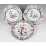 A pair of Chinese famille rose export porcelain plates, Yongzheng period, each painted with a