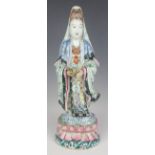 A Chinese famille rose enamelled porcelain figure of Guanyin, late 19th century, modelled