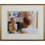 AUTOGRAPHS. Two autographed colour photographs of Macaulay Culkin, signed in blue ink, 23.5cm x