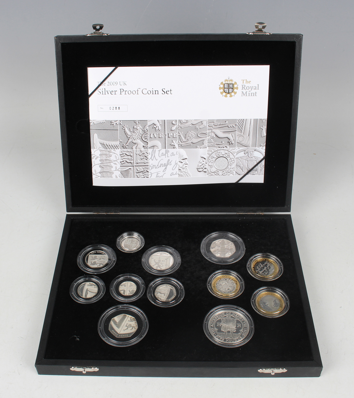 An Elizabeth II Royal Mint silver proof twelve-coin set 2009, including a Kew Gardens edition