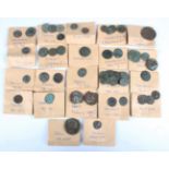 A group of Roman bronze and silver coinage, including a sestertius of Galba (68-69 AD) and a