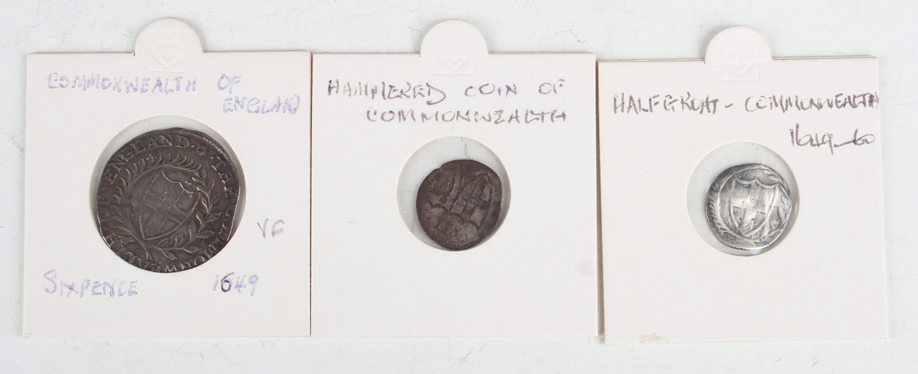 A Commonwealth of England sixpence 1649, mintmark sun, and two Commonwealth half-groats.Buyer’s