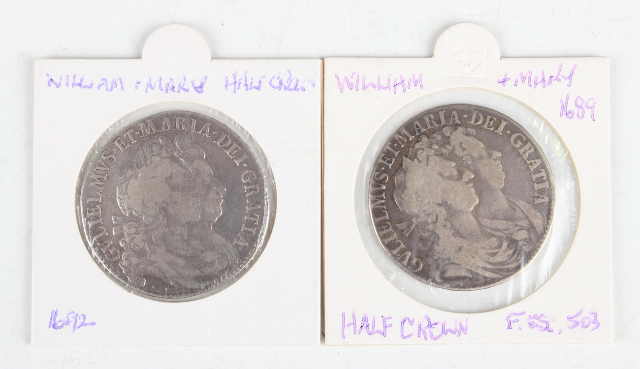 A William and Mary half-crown 1689, edged detailed 'Primo', and a William and Mary half-crown