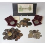 A group of Georgian and later coins and tokens, including a George V crown 1935, a Flint Leadworks