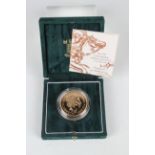 An Elizabeth II Royal Mint gold proof Brilliant Uncirculated five pounds coin 1999, cased with