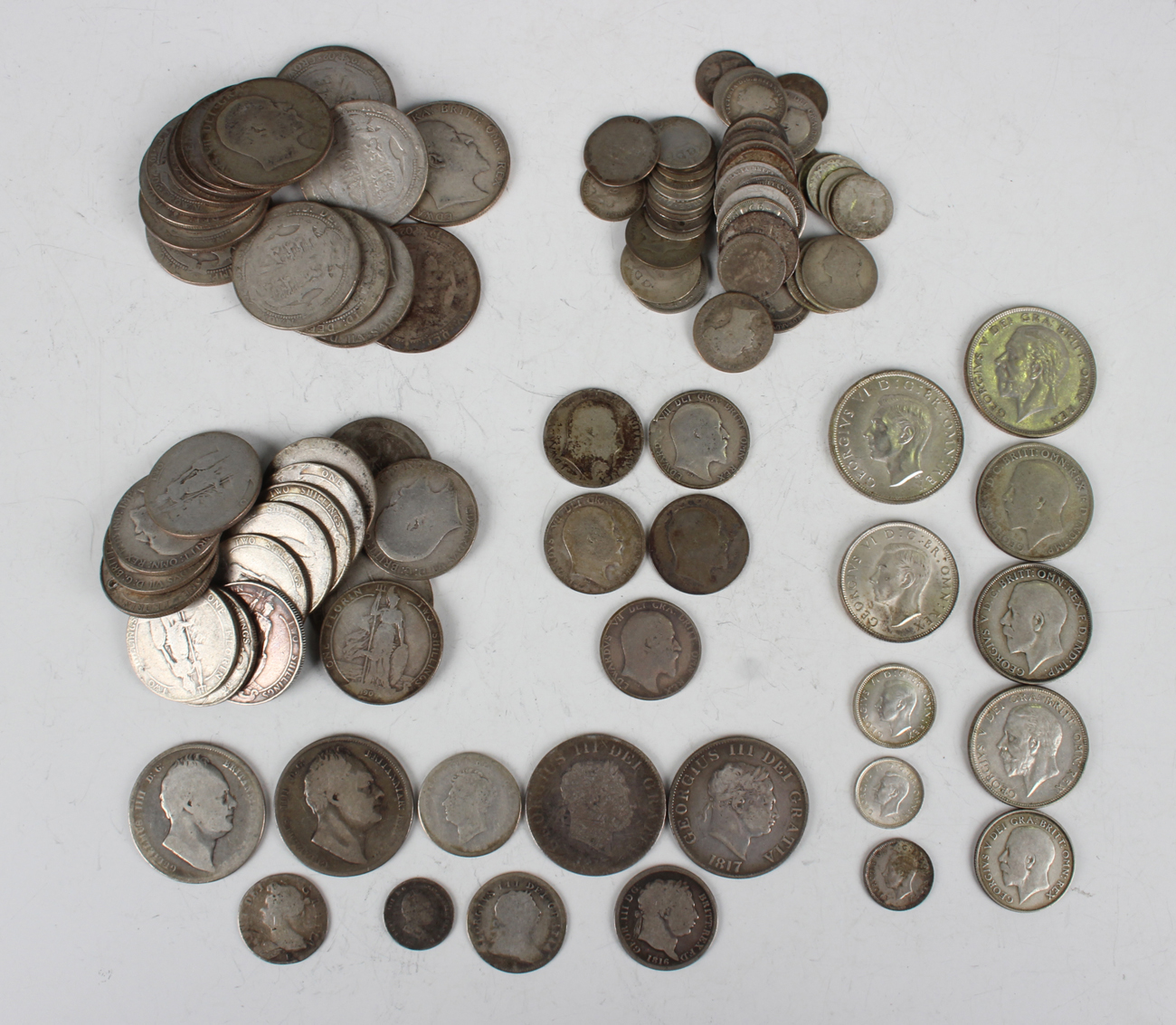 A collection of Edward VII silver coinage, including half-crowns and florins.Buyer’s Premium 29.