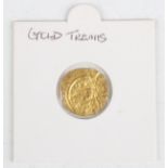 A Heraclius (610-641 AD) gold tremissis, Constantinople Mint.Buyer’s Premium 29.4% (including