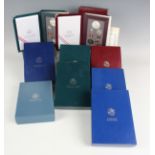 A group of nine USA United States Mint prestige year-type coin sets, comprising two 1986, 1987,