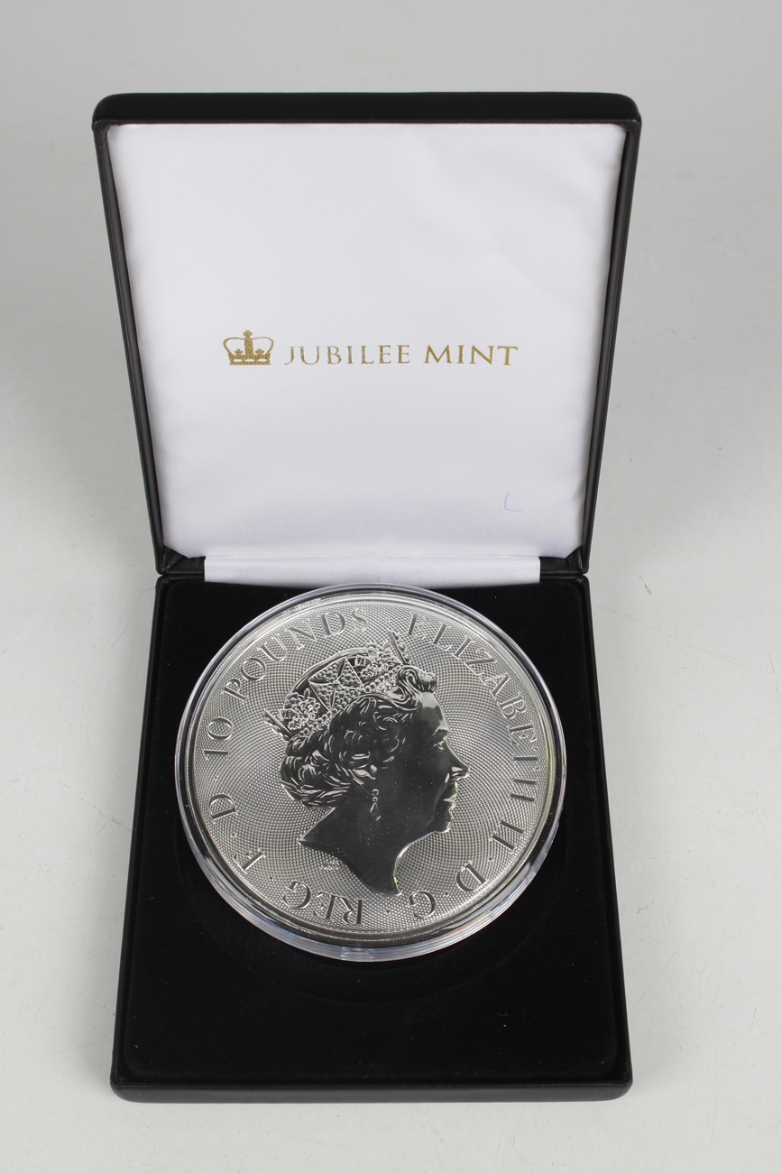 An Elizabeth II Jubilee Mint ten-ounce silver ten pounds commemorative coin 2021, cased.Buyer’s