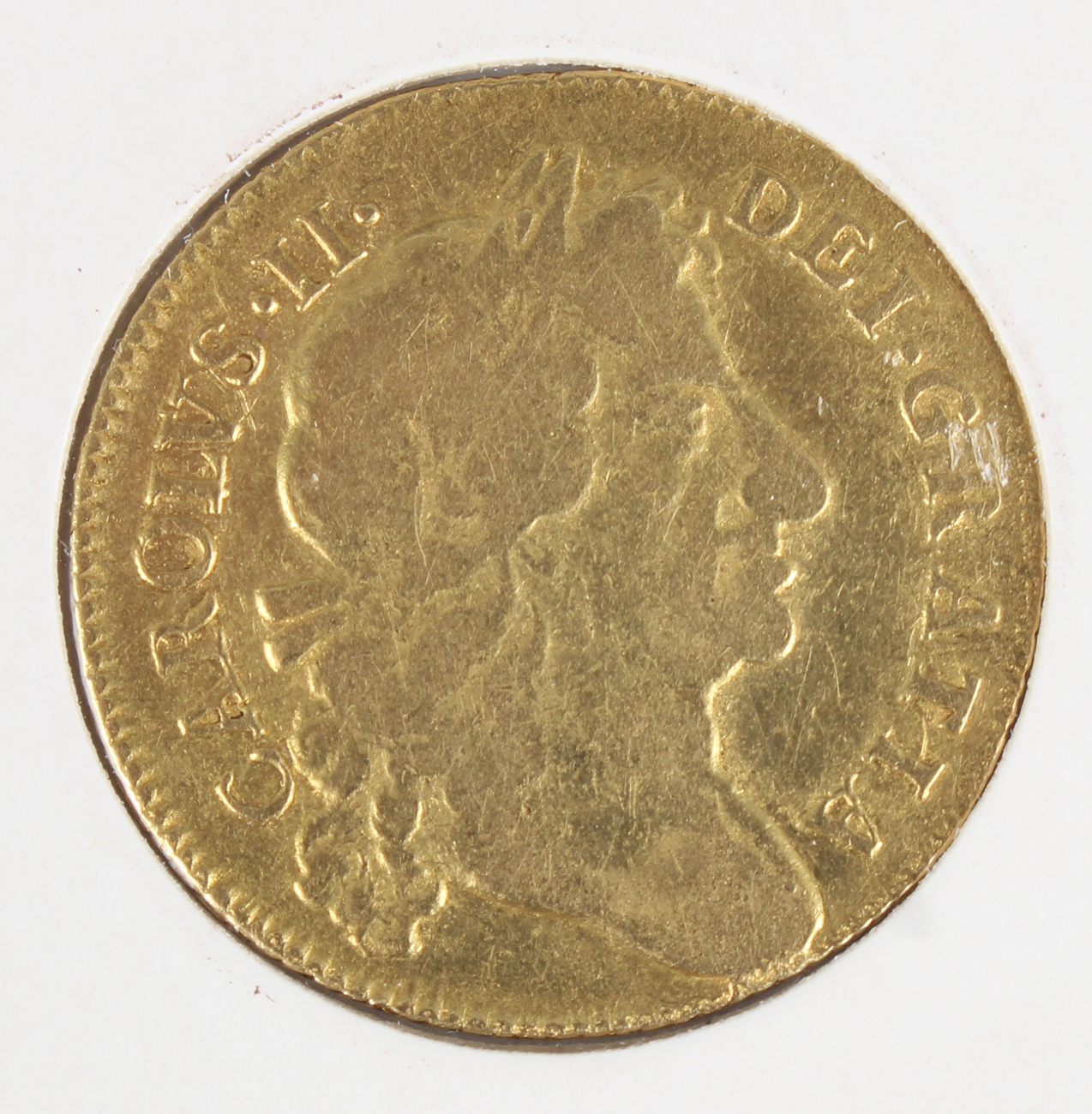 A Charles II gold guinea 1679.Buyer’s Premium 29.4% (including VAT @ 20%) of the hammer price.