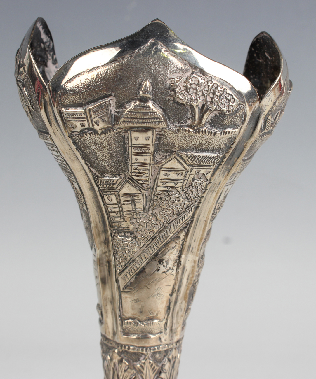 An Indian white metal posy vase, embossed with buildings in landscapes, on a circular foot, height - Image 8 of 10