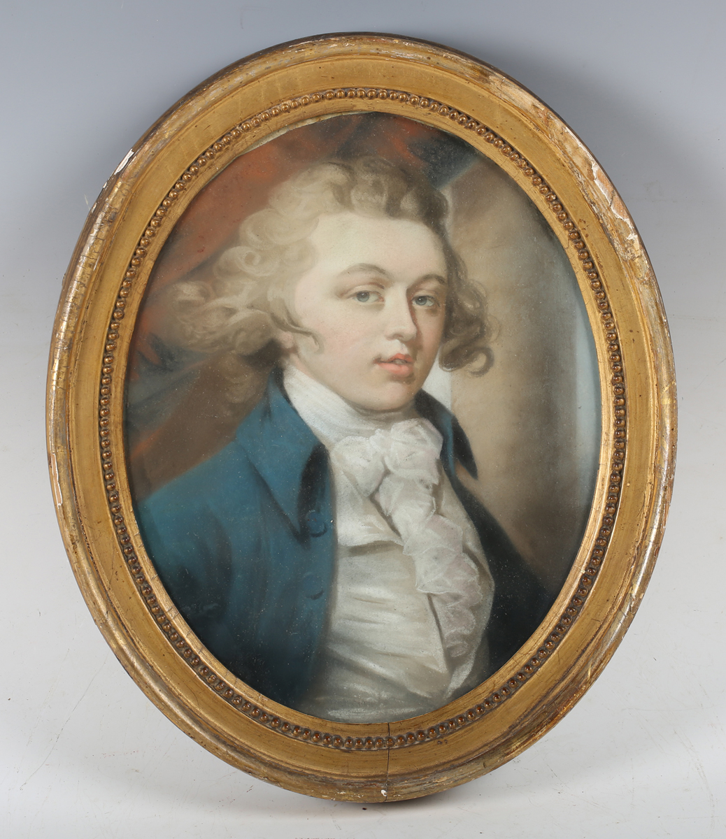Circle of Daniel Gardner - Oval Half Length Portrait of a Young Man wearing a Blue Jacket, Silk