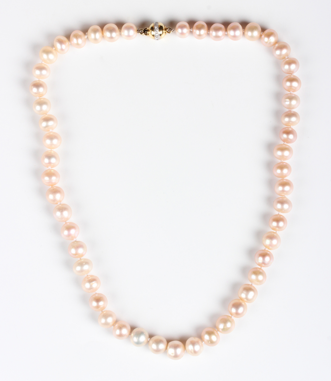 A single row necklace of slightly graduated cultured pearls on an 18ct gold and diamond set